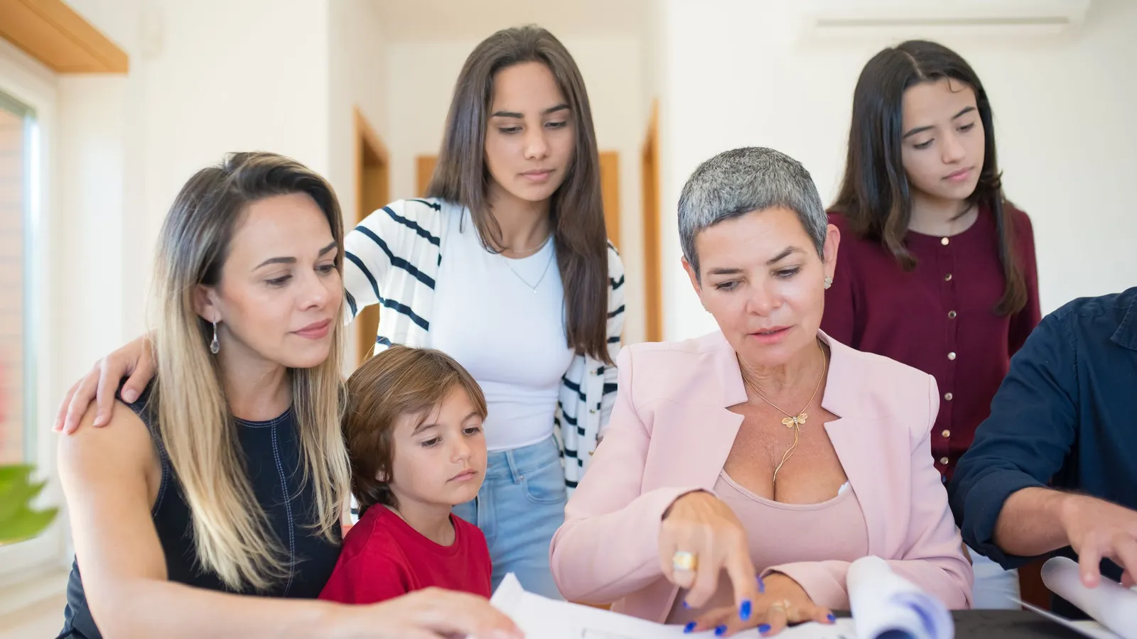 Family discussing long-term financial priorities